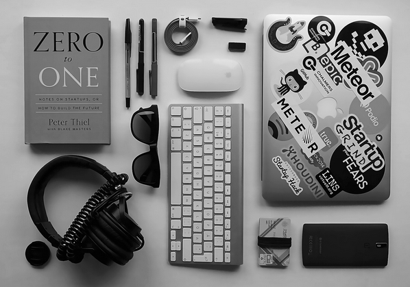Laptop, Book, Headphone, Pen, Card, Phone & Mouse on the Table